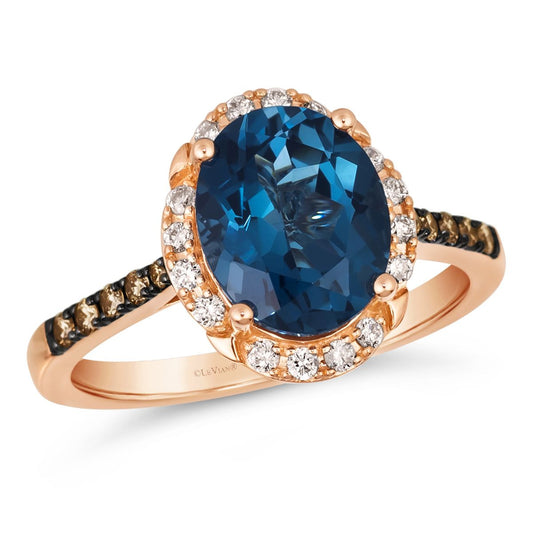 Le Vian Chocolatier Ring: Deep Sea Blue Topaz center, haloed by white diamonds with chocolate diamonds on the 14K rose gold band.